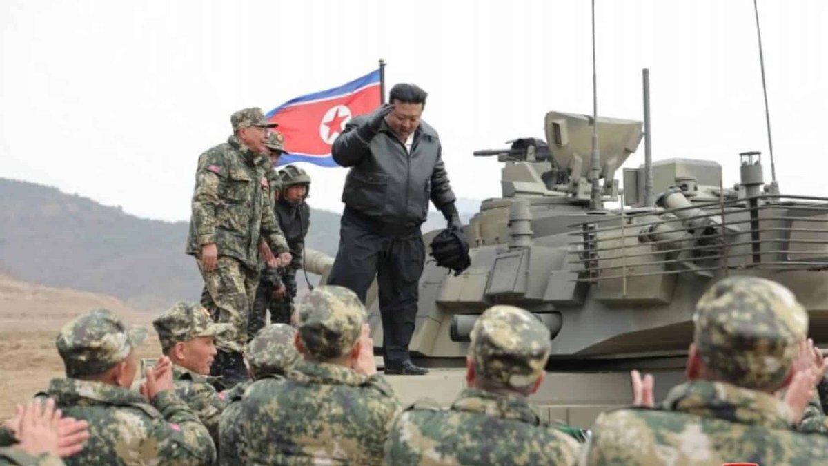 Kim Jong Un Drives New Military Tank In Mock Battle